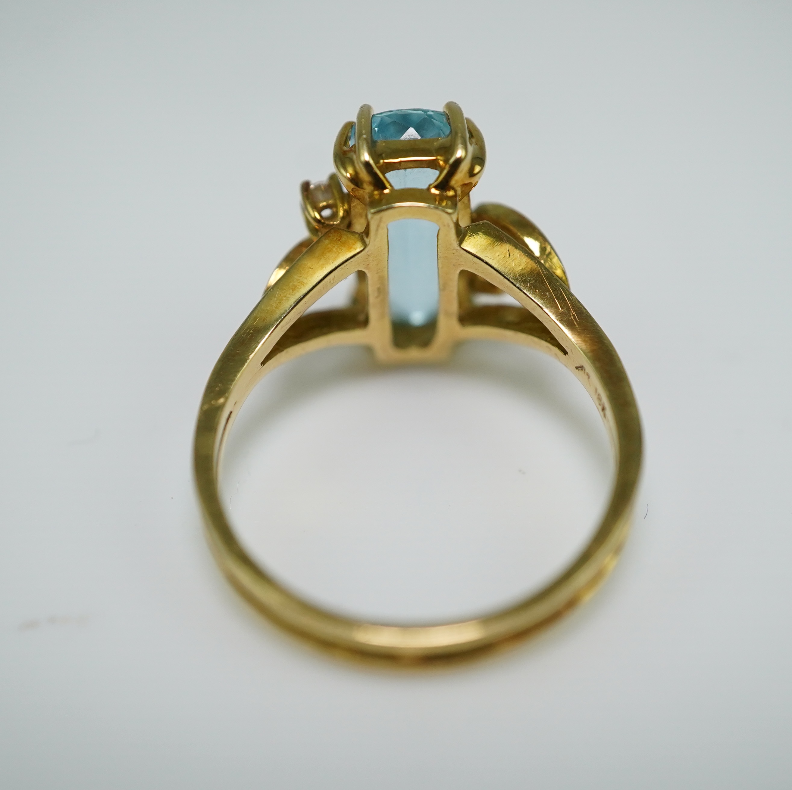 An aquamarine and diamond ring